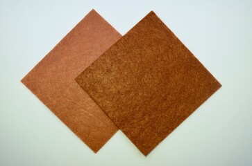 colored brown felt fabric texture abstract background. Surface felted fabric texture abstract background