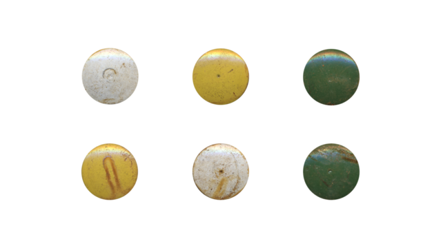 a set of colorful aged circles, rusty stationery tacks in png format, front view, isolated metal push rounded pins on transparent background	