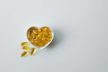 Omega 3 vitamins on a bright background, copy space