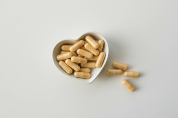 Vitamin capsules for the heart top view