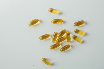 Omega 3 vitamins on a bright background, copy space