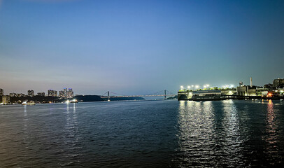 Fototapeta premium Hudson River at Night. View of George Washington Bridge. West Harlem Piers. Manhattan New York City
