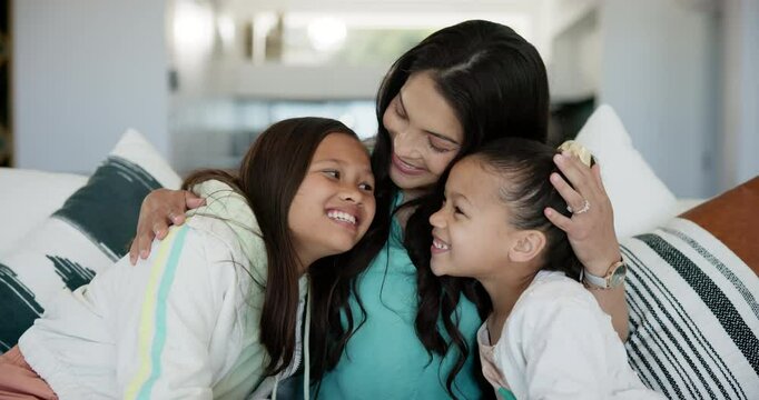 Love, hug and mother with girl children on a sofa with support, care or trust in their home. Happy family, smile and mom with kids in a living room for conversation, bonding or fun weekend freedom
