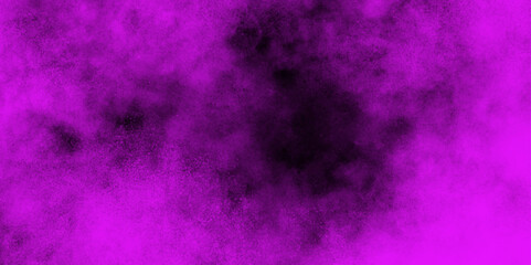 Pink steam on a black background. A pumpkin with a scary face is lit up and surrounded by smoke. Smoke Fog or smoke color isolated background for effect, text or copy space. 