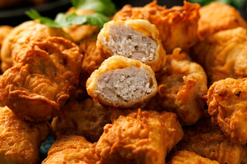 Homemade crispy fried chicken nuggets served with ketchup