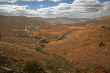Panoramic viewpoint of the volcanic landscape along the coast of the island of Fuerteventura, Canary Islands, Spain