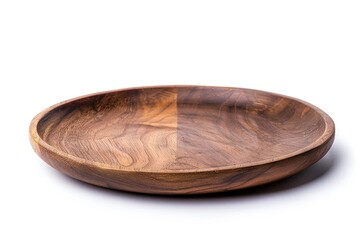 Obraz premium A wooden bowl sits on a clean white surface, perfect for serving or displaying small items