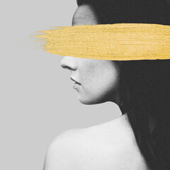 Profile of a woman with a bold gold brush stroke across the eyes. Black and white model portrait. Grunge, noise and motion blur retro vintage effect applied
