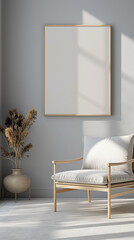 Minimalist interior of modern bright living room with boho style armchair and empty frame for poster mockup on grey wall with soft light