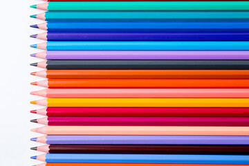 pencils of different colors on a white background