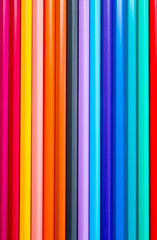 Obraz premium The multicolored pencils are neatly lined and textured. taken in close-up