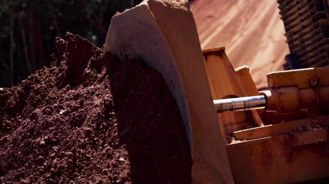 Slow motion video of a bulldozer are being used in road construction project