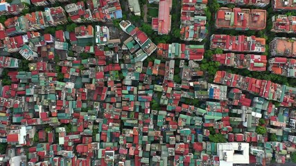 Aerial, vietnam and landscape with buildings with population, cityscape and architecture development. Drone, village and urbanization for property infrastructure, houses and sustainability problem