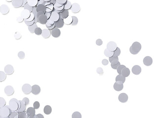 Silver_confetti_foil,_falling_on_a_white_background,_perfect_for_festive_or_celebratory_designs.