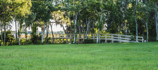Beautiful pier leading to a lake in Florida.