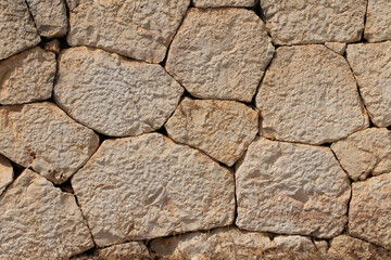 Wall texture of a Roman era constructed building as a stone background