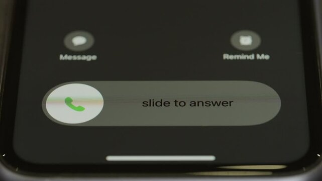 Incoming call on mobile phone close up macro video. Take or decline the phone call
