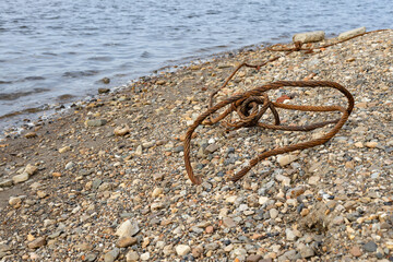 old and rusty iron rope