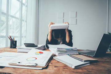 Overwhelmed and Buried: A businesswoman hides behind a mountain of paperwork, her desk overflowing...