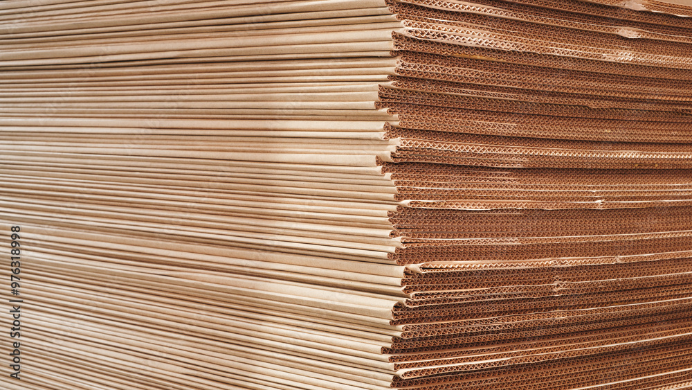 Leinwandbilder a stack of brown cardboard boxes. the boxes are stacked on top of each other and are brown in color
