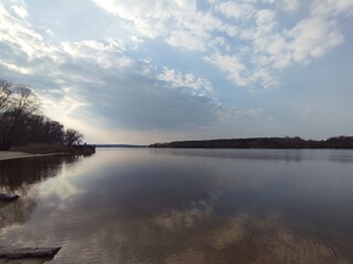 Mosaic of spring clouds and river
