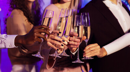 Cheers. Hands Clinking Glasses. Unrecognizable People Drinking Champagne Having Party Celebrating New Year Holiday Indoor. Selective Focus, Panorama