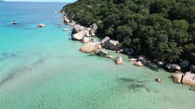 Turquoise lagoon and Santa Giulia beach in Corsica, recorded by drone.