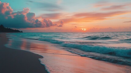 Peaceful ocean sunset with soft, colorful clouds.