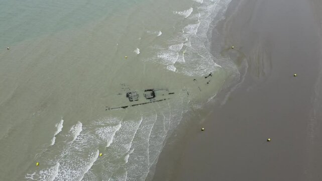 Visual drama of a battleship on Dunkirk&rsquo;s beach from an aerial perspective visual drama of a battleship on Dunkirk&rsquo;s beach from an aerial perspective