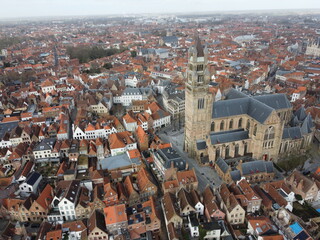 Brugge from an aerial perspective, highlighting its historical charm, architectural beauty, and scenic waterways
