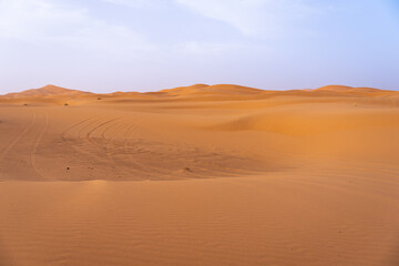 Erg Chebbi dunes at sunrise with harsh light