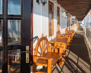 a promenade deck for passengers of an ancient steamship of the early 20th century