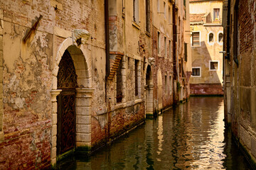 Venice and its buildings,canals,gondolas,and sculptures
