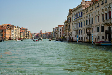Venice and its buildings,canals,gondolas,and sculptures
