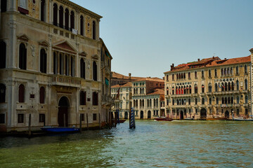 Venice and its buildings,canals,gondolas,and sculptures