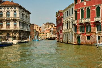 Venice and its buildings,canals,gondolas,and sculptures