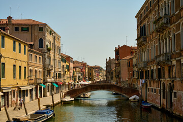 Venice and its canals, boats,sculptures and birds. 