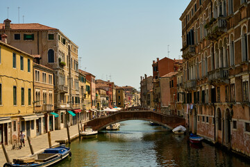 Venice and its canals, boats,sculptures and birds. 