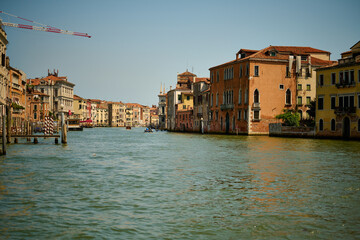 Venice and its canals, boats,sculptures and birds. 
