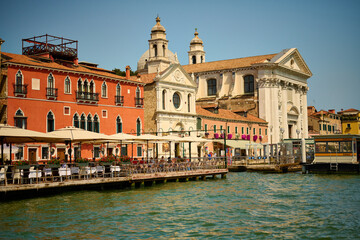 Venice and its canals, boats,sculptures and birds. 