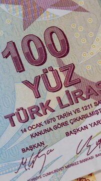 100 Turkish lira TRY banknote displayed. Currency note. Represents value in Turkish monetary system. Essential for transactions in Turkey 
