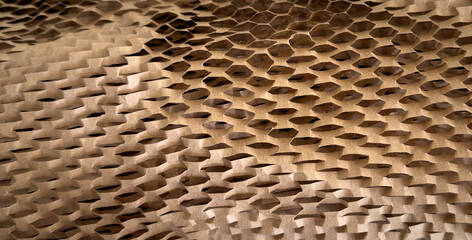 Brown honeycomb shaped packaging paper background texture