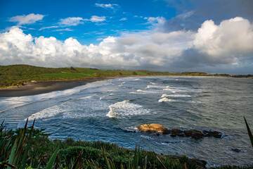 Rugged beach and costal scene on the cliffside walk by the ocean