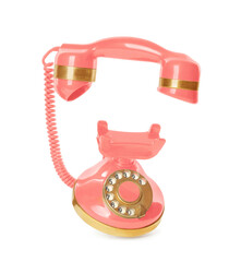 Elegant vintage coral telephone isolated on white