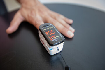 Digital Pulsometer concept. Technological device for measuring heart rate and blood oxygen...