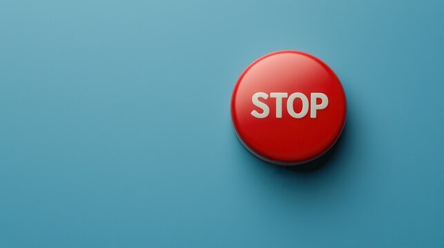 A red button with the word stop written on it