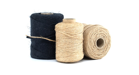 Assorted jute and twine spools on white background showcasing natural fiber materials
