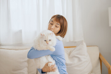 girl and Persian cat