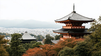 Naklejka premium A serene view of traditional Japanese pagodas overlooking a mist-covered city and surrounding mountains in autumn.