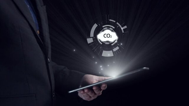 Business person implements initiatives to reduce CO2 emissions, aiming for net zero. Showcases commitment to sustainability by reducing CO2 for a greener planet. UUID